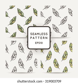 Set of vector seamless pattern of feathers. Doodle. Zentangle
