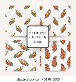 Set of vector seamless pattern of feathers. Doodle. Zentangle