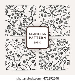 Set of vector seamless pattern with random skulls. Scary design.