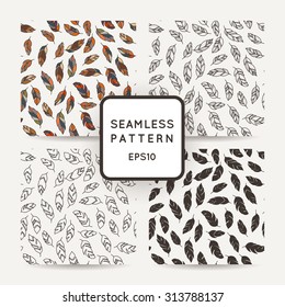Set of vector seamless patterns of feathers. Doodle. Zentangle