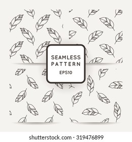 Set of vector seamless patterns of feathers. Doodle. Zentangle