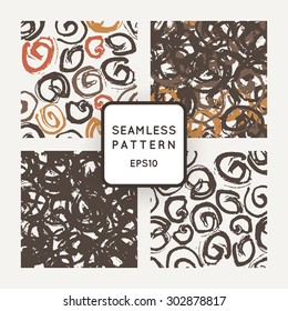 Set of vector seamless patterns with grungy hand-drawn spiral elements