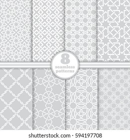 Set of vector seamless patterns. Modern geometrical textures with with crossed geometric shapes. Intersecting stars, rhombuses, diamonds, squares, circles. Regularly repeating luxury wallpapers.