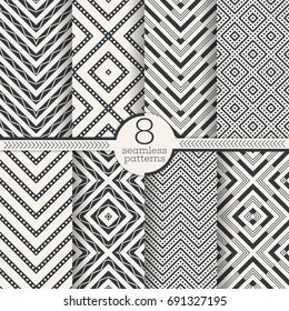 Set of vector seamless patterns. Modern stylish geometric textures. Infinitely repeating geometrical ornaments with rhombus, diamond, zigzag and wave shapes. Traditional tiles.