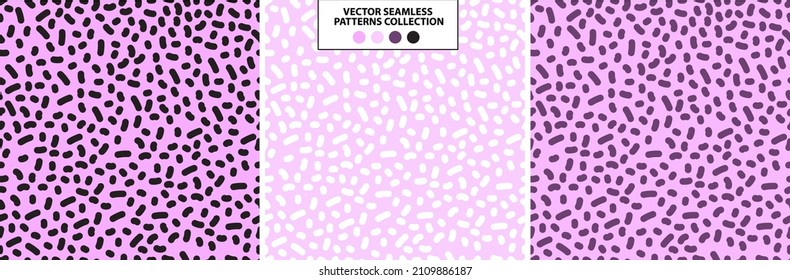 set of vector seamless texture with dots or small specks in black and white and purple colors