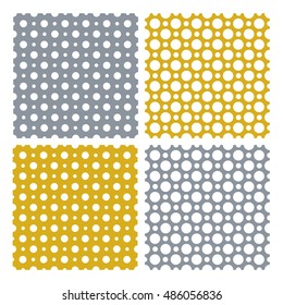 Set of vector seamless trendy modern spotted patterns. White spots on gold and gray silver backgrounds. Seamless pattern for web print, textile print, wrapping paper, wallpaper, invitation card