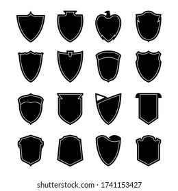 Set of vector shields isolated on white. Shield silhouettes. Vector illustration.