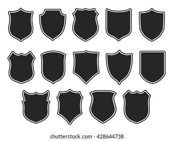 Set of vector shields isolated on white. Shield silhouettes. Vector illustration.