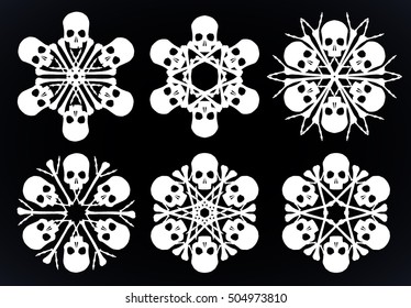 Set of vector silhouette snowflakes made of skulls and bones in white isolated over black background.