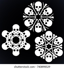 Set of vector silhouette snowflakes made of skulls and bones in white isolated over black background.