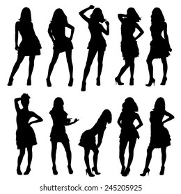 Set of vector silhouettes. Beautiful, slim, young girls in different poses.