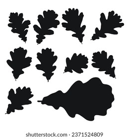 Set of vector silhouettes of a black shape of oak leaves
