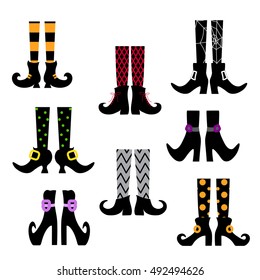 Set of vector silhouettes of colored witches legs in stockings and shoes on a white background. Halloween party.