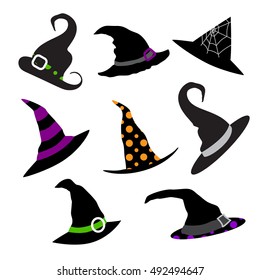 Set of vector silhouettes of colored witches hats on a white background. Halloween party.