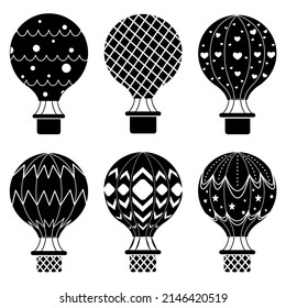 A set of vector silhouettes of hot air balloons isolated on a white background.