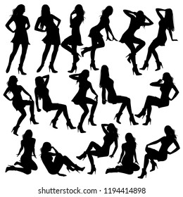 Set of vector silhouettes of slim girls with long hair in different poses. Icons of sexy girls in high heels