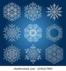 Conjunto de copos de nieve vectoriales. Colección de adornos de invierno azules y blancos. Colección de copos de nieve. Copos de nieve para fondos y diseños
