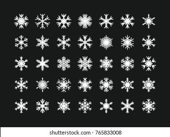 Set of vector snowflakes. Festive Christmas and New Year background. Snow winter pattern. Vector illustration.
