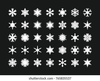 Set of vector snowflakes. Festive Christmas and New Year background. Snow winter pattern. Vector illustration.