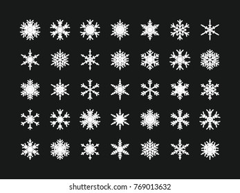 Set of vector snowflakes. Festive Christmas and New Year background. Snow winter pattern. Vector illustration.
