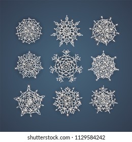 Set of vector snowflakes with glittering textures, background for winter and christmas theme. Vector illustration. EPS10.