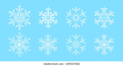 Set of vector snowflakes isolated on blue background. Elements for design on Christmas