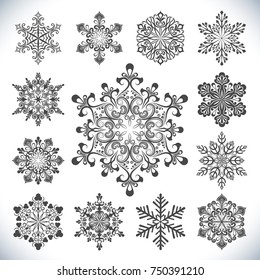 Set of vector snowflakes isolated on white background. Collection of 13 black snowflake shapes to use as brushes or design elements.