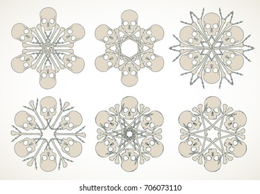 Set of vector snowflakes made of skulls and bones in beige isolated over white background.