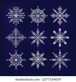 Conjunto de copos de nieve vectoriales sobre fondo azul oscuro