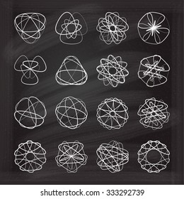 Set of vector spirograph design elements on the chalkboard
