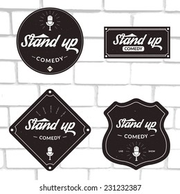 Set of vector stand up comedy logos and badges at white brick background. Modern and retro microphones. Hipster style labels and banners for print and web design.