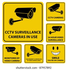 A set of vector surveillance and CCTV camera yellow signs.