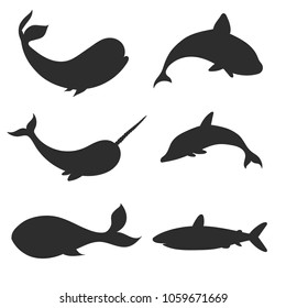 Set of vector underwater life silhouettes with whales, shark, narwhal and dolphin. Sea creatures shapes 
isolated on the white background.