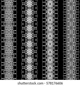 Set of vector vintage decorative borders. White on black background.