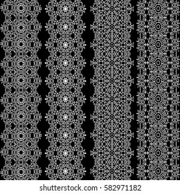 Set of vector vintage decorative borders. White on black background.