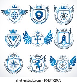 Set of vector vintage emblems created with decorative elements like crowns, stars, bird wings, armory and animals.  Collection of heraldic coat of arms.