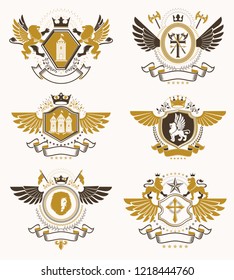 Set of vector vintage emblems created with decorative elements like crowns, stars, bird wings, armory and animals.  Collection of heraldic coat of arms.