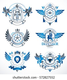 Set of vector vintage emblems created with decorative elements like crowns, stars, bird wings, armory and animals.  Collection of heraldic coat of arms.