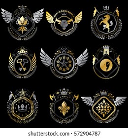 Set of vector vintage emblems created with decorative elements like crowns, stars, bird wings, armory and animals.  Collection of heraldic coat of arms.