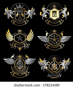 Set of vector vintage emblems created with decorative elements like crowns, stars, bird wings, armory and animals.  Collection of heraldic coat of arms.