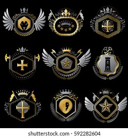 Set of vector vintage emblems created with decorative elements like crowns, stars, bird wings, armory and animals.  Collection of heraldic coat of arms.