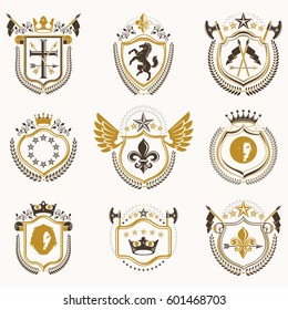 Set of vector vintage emblems created with decorative elements like crowns, stars, bird wings, armory and animals.  Collection of heraldic coat of arms.