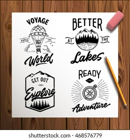 Set of vector vintage hand drawn logotype with lettering elements on wood planks