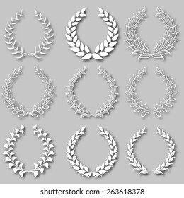 Set of vector white laurel wreaths with shadows on the gray background for page decoration, web design. Floral elements in vintage style. Vector illustration EPS 10.