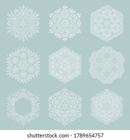 Conjunto de copos de nieve vectoriales blancos. Bonitos adornos blancos de invierno. Colección de copos de nieve. Copos de nieve para fondos y diseños