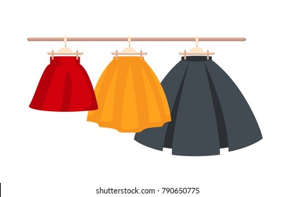 Set Vector Women's High Waisted Street Skirt Skater Pleated Full Midi Skirts on the hanger.three colored skirts on hangers.Clothing for women and girls.illustration isolated from white background