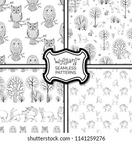 Set of vector woodland seamless patterns. Cute doodles wild animals and birds, trees and bushes. Fox, moose, deer, bear, squirrel, raccoon, hedgehog and others. Tileable backgrounds.