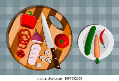 Set of vegetables of bell pepper and onions. Vegetables are cut to pieces. Onions cut into rings, top view. Vegetarian and vegan food recipes banner with kitchenware, utensils and chopped vegetables