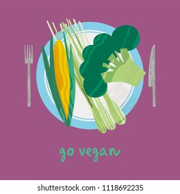Set of vegetables on plate with knife and fork