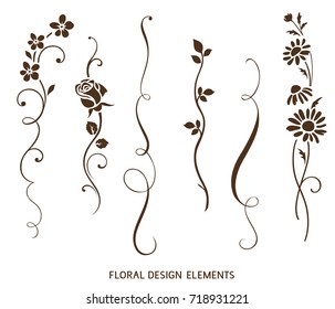 Set of vertical calligraphic elements and flower silhouette for frame design. Vector vintage ornaments for greeting card decor